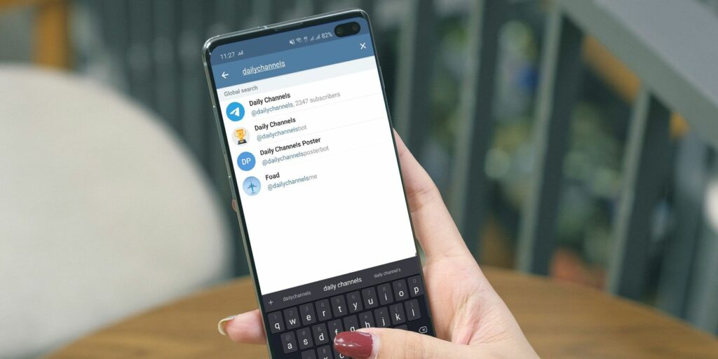 User browsing Telegram channels on a smartphone