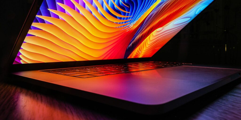 MacBook with colorful background