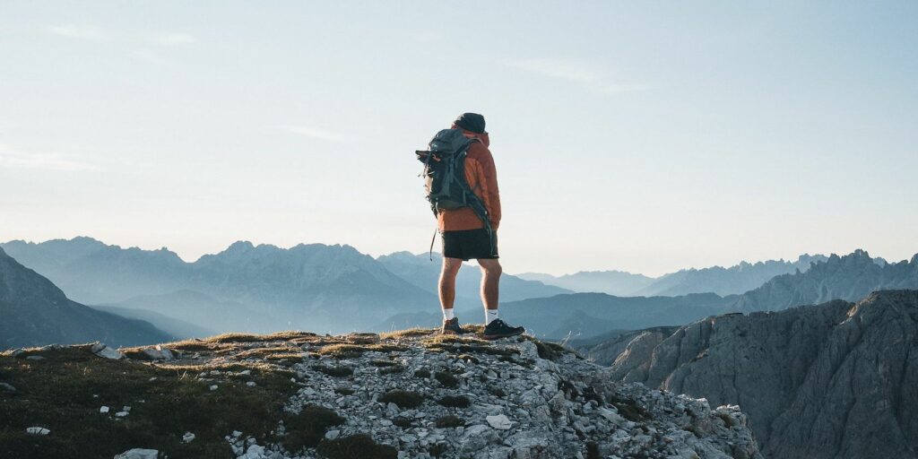 Man on top of a mountain