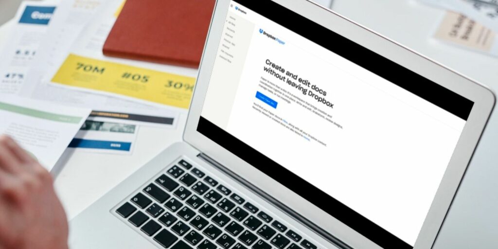 Image shows the Dropbox Paper home screen on a laptop