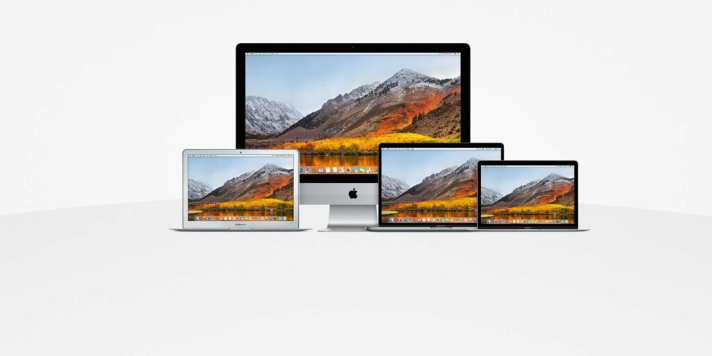 Various Mac movels over a gray background