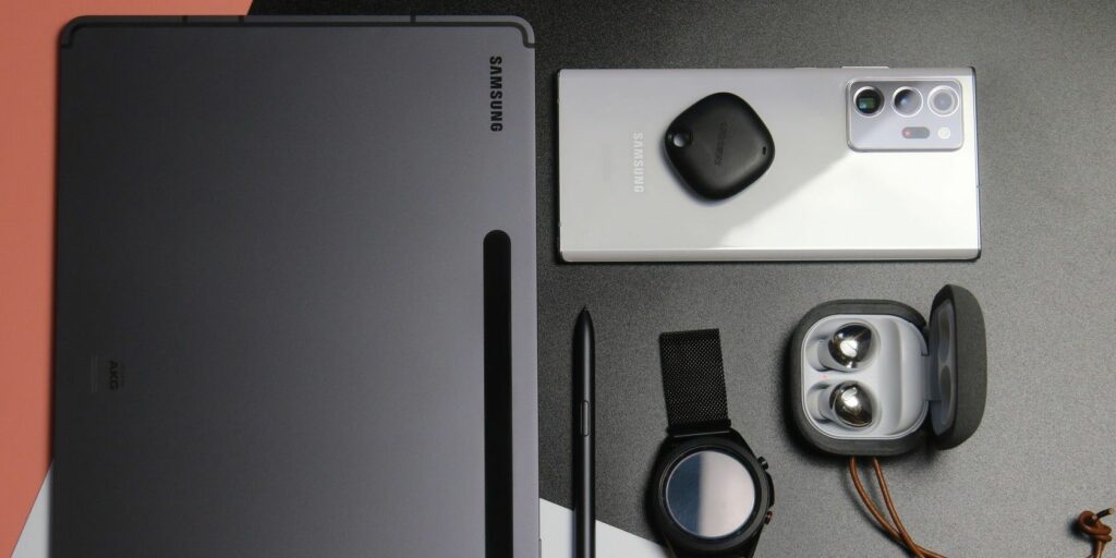 Samsung tablet, smartphone, earbuds, and smart watch
